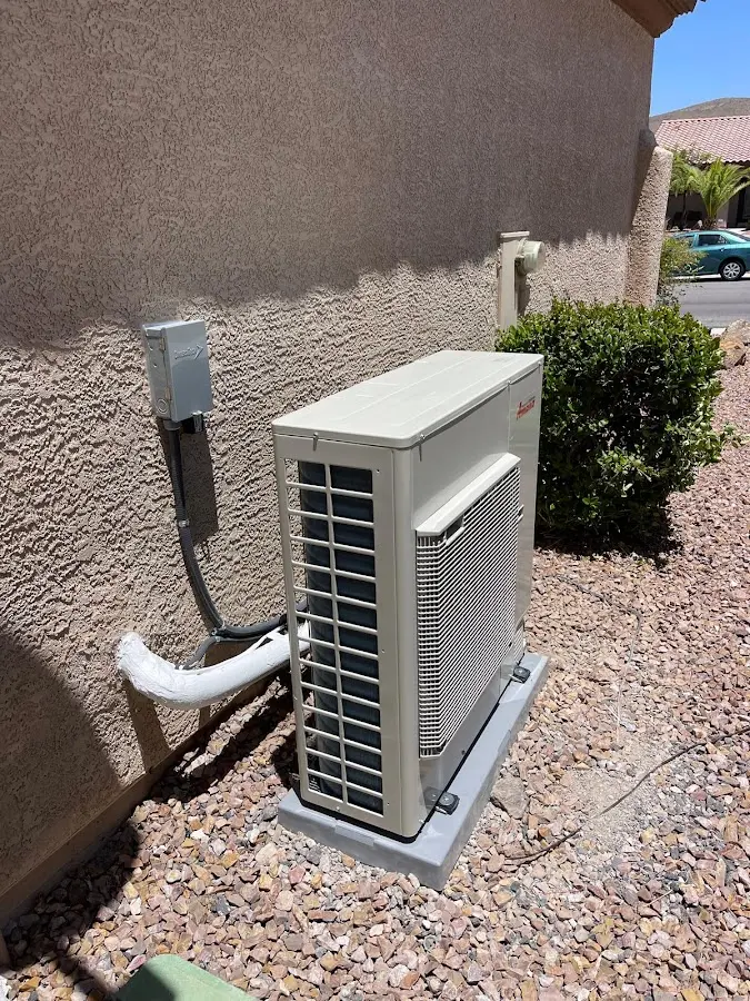 Residential air conditioning condenser unit in Spring